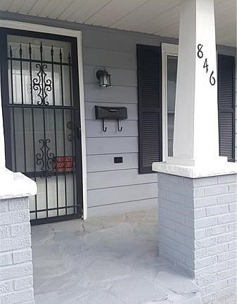 Neutral tones and black accents to add to the curb appeal.