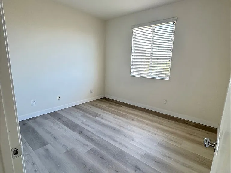 7912 Natoma St — Photo 10