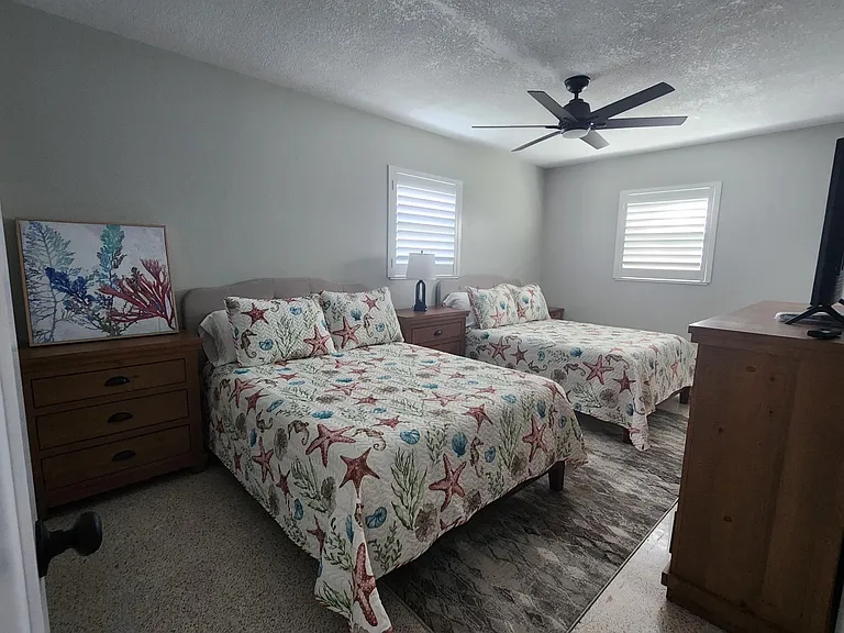 2nd Bedroom with 2 Full beds Previously staged