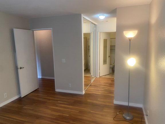 Bedroom with hall and closets