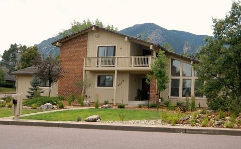 Front of house with mountain backdrop