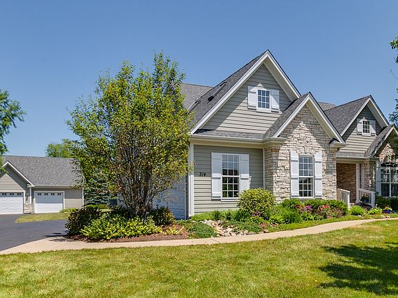 Plenty of parking for everyone with an attached 2.5 car garage, detached 2.5 car garage, and a drive