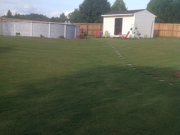 Back yard with pool and shed