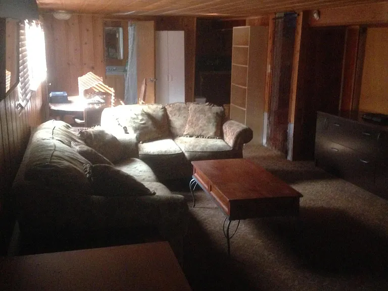 living space looking toward bath and simi-kitchen