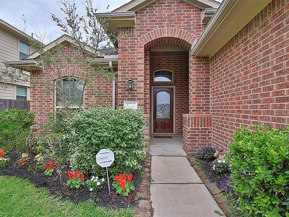 Landscaped entry welcomes you.