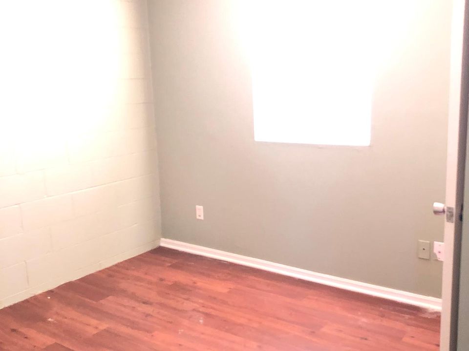 Bedroom 1 wood floors