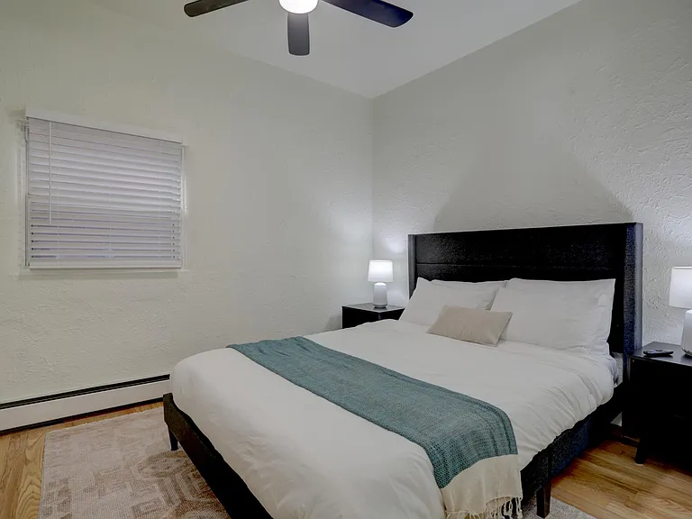 Bedroom 2 with queen bed and smart tv