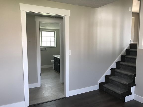 Plastic on stairs for showings to protect new carpet.
