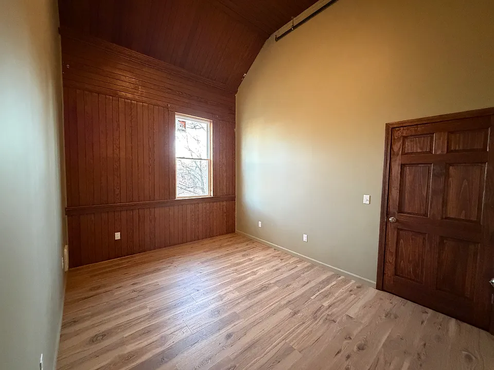 Bedroom #1 with vaulted ceiling