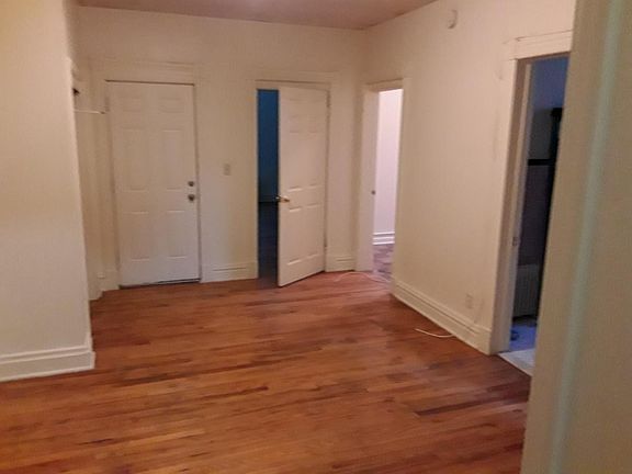 Living room looking into bedroom doors
