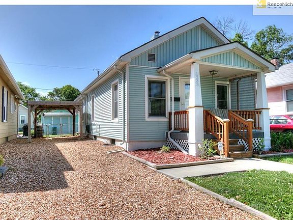 This is the driveway with a carport.