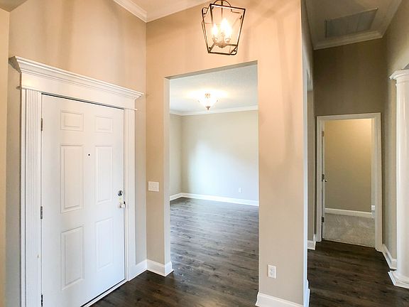 Carlton entry view to living room master suite entry