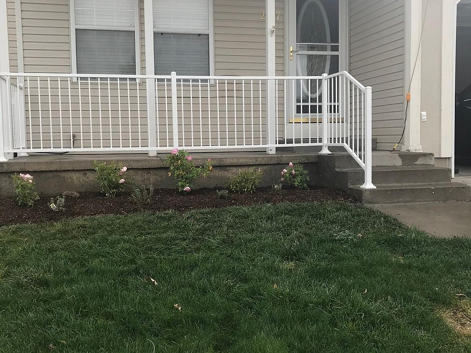 Newly Landscaped yard. Beautiful decorative Beveled Glass paneled door with Storm Door