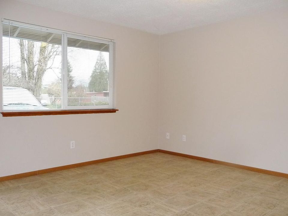 Good sized living room is light and bright. This compact apartment has a great floor plan and is comfortable.