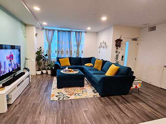 Living Room with Beautiful Accent Wall - Level 1