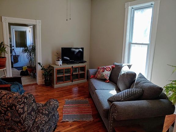 Living Room with view to Kitchen and Back Porch / Alternate Furnishings