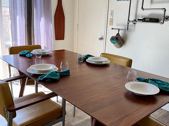 Patio door in dining room leads to more seating.