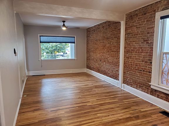 Entry / living room. Large window looking out front.