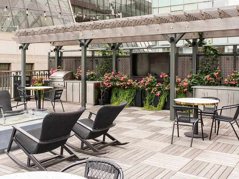 Rooftop patio with grills and fireplace