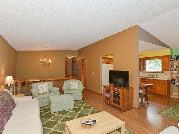 Upgraded wood steps and oak railing is just one of the 'extras' of your home.