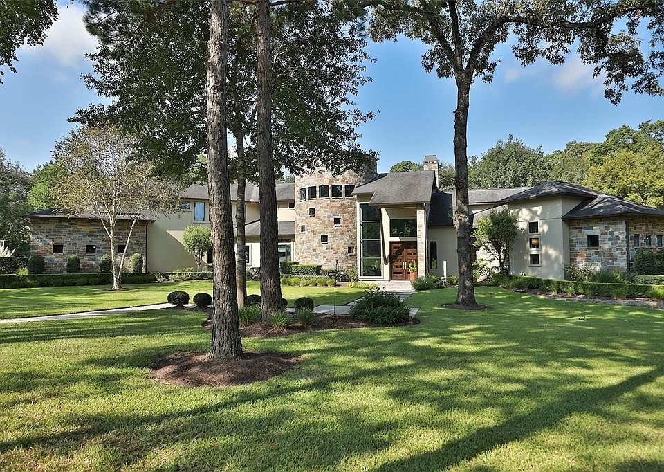 Gorgeous Custom home on over 2 acres in the prestigious Gated subdivision of Huntington Woods Estates! Close to 99 and 249. Just 5 minutes to downtown Tomball...Three bedrooms, three full baths, two Half baths Large separate office downstairs. Gamero