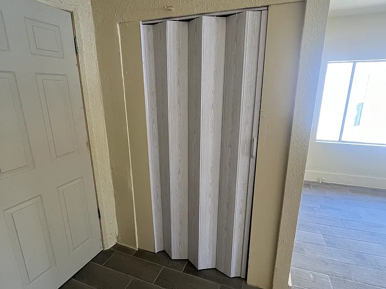Hallway storage space with enclosure