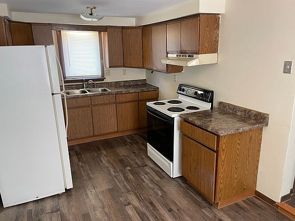 Kitchen with refrigerator and stove