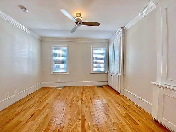 Bedroom top floor with built in closets and drawers