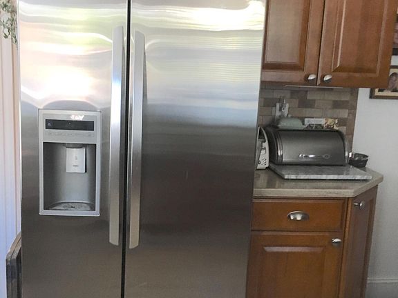 The updated kitchen features Bosch and LG appliances. The up