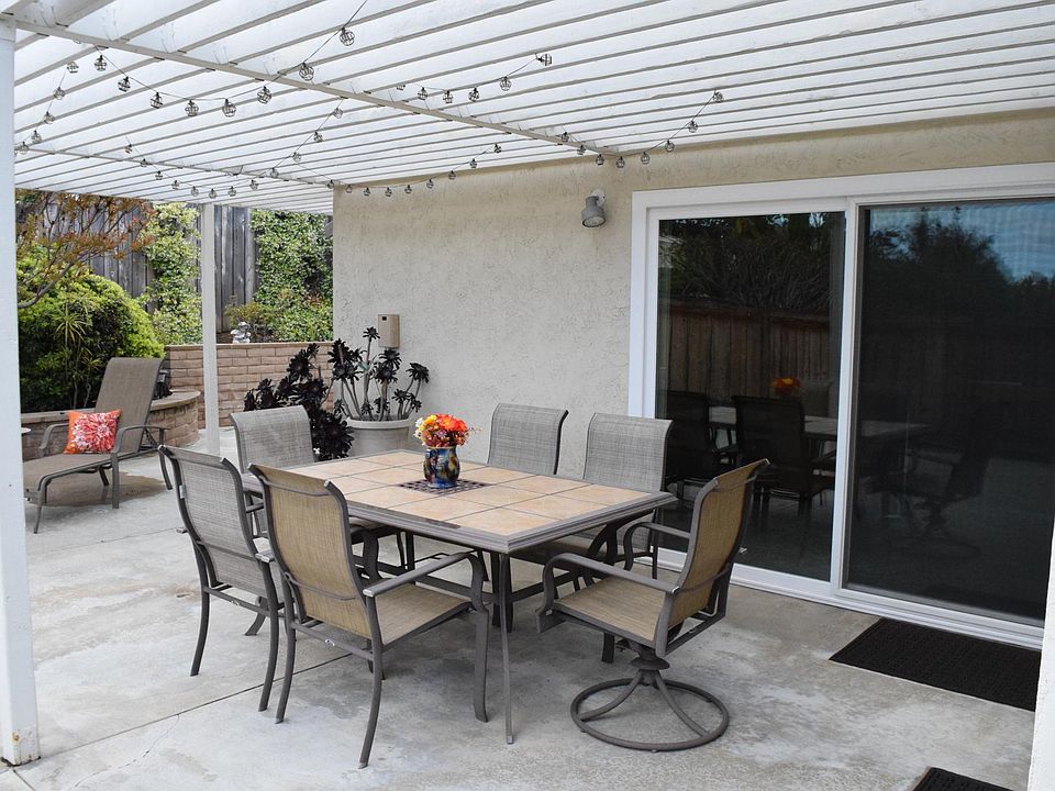 Fun solar lights over patio table create great evenings for entertaining.