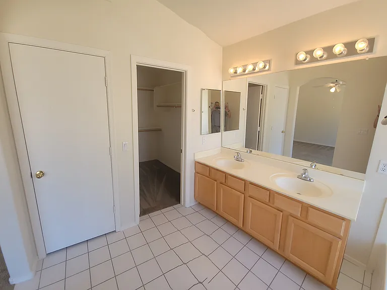 Master bathroom with walk-in closet.