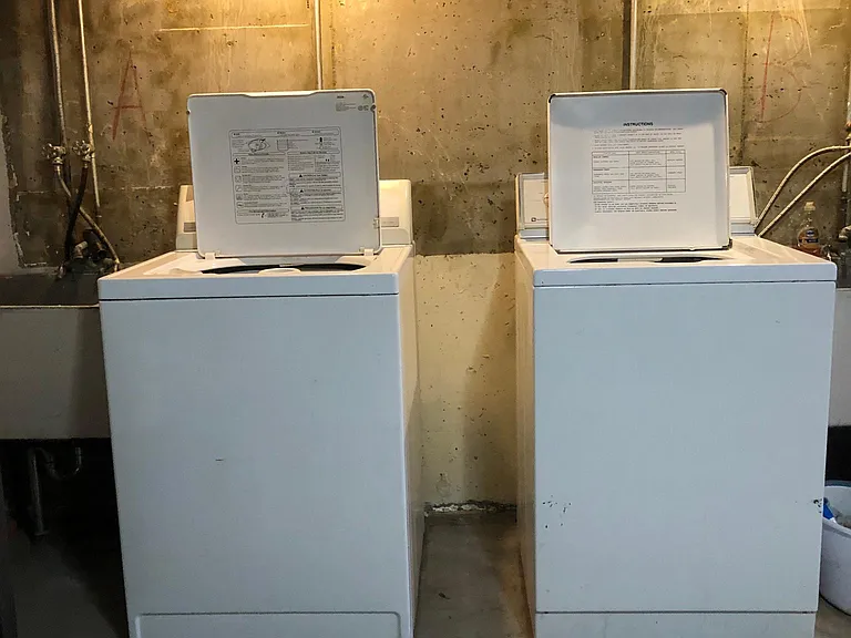 Each unit has their own washer in basement.