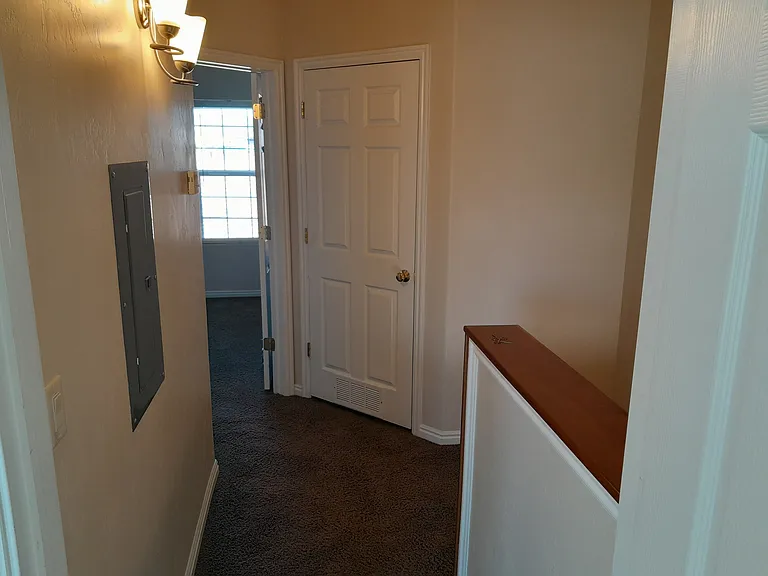 upstairs hallway/ bed 2 door/ laundry door
