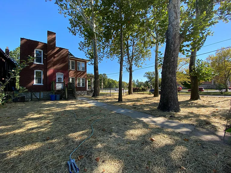 Huge Fenced Backyard with Park like trees and new grass that has since grown in! Great shade canopy in the middle of summer and keep bills low!