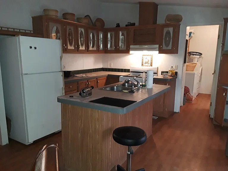 Kitchen Recently Updated
New Refrigerator separate picture
Island with sitting area