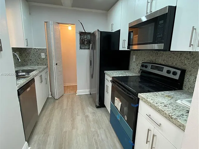 556 NW 114th Ave #203 — Photo 1