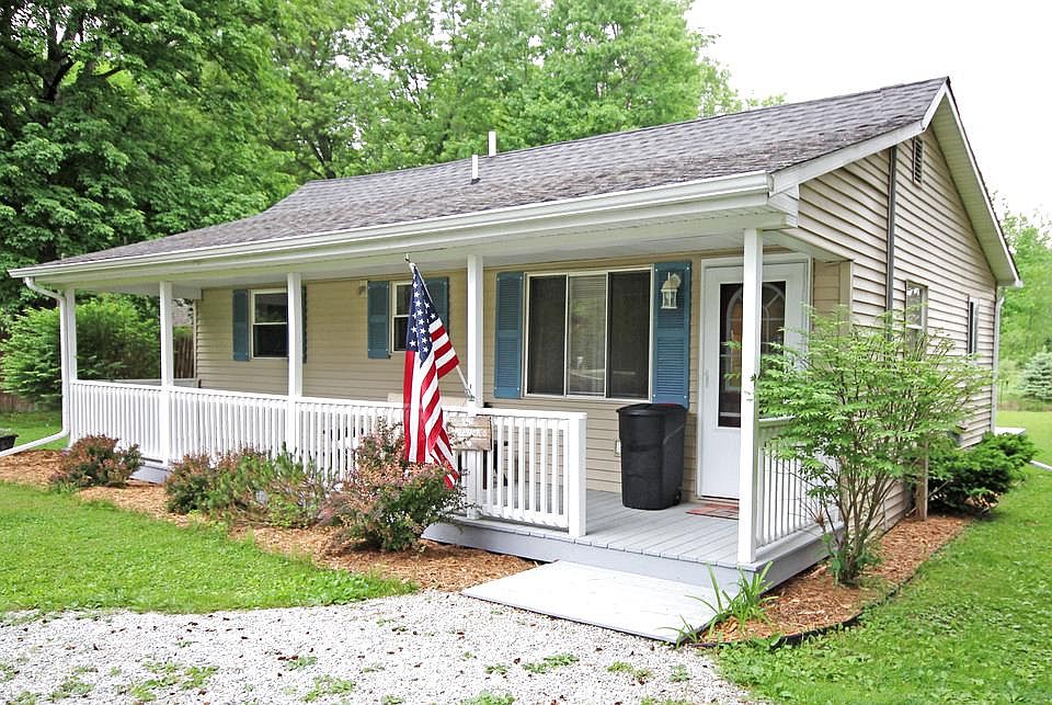 Fall in love with this stunning 2 bedroom 1 bath country home located in Thomas Twp.  A welcoming front porch is just the beginning as you enter this completely updated home.  