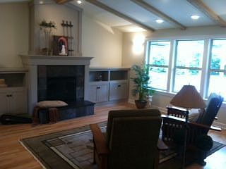 Vaulted living with gas fire and great backyard views