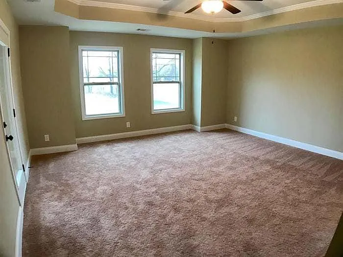 Mater bedroom (1st floor) with access door to back yard.
