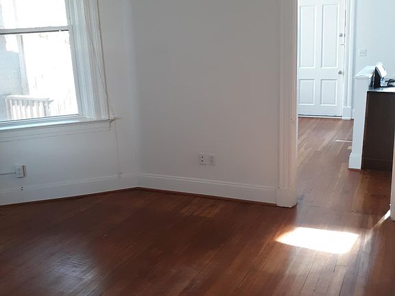 Living Room looking into the kitchen/dining room