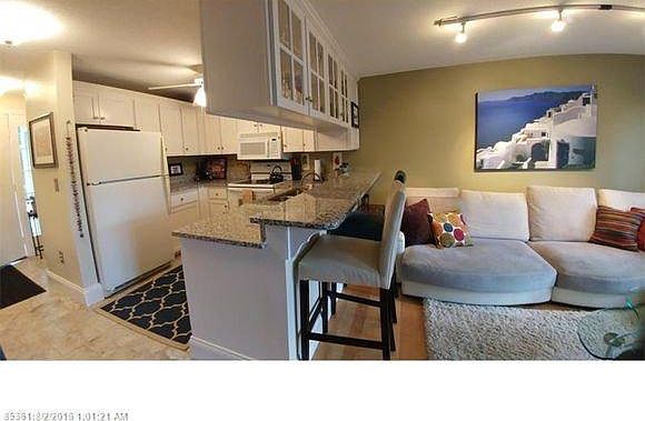 Open kitchen flows into living/dining room