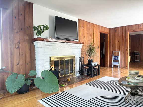 Living room with wood fireplace
