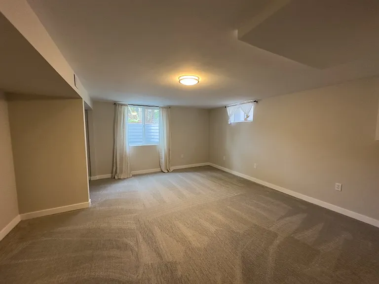 Downstairs bedroom. NW corner.
