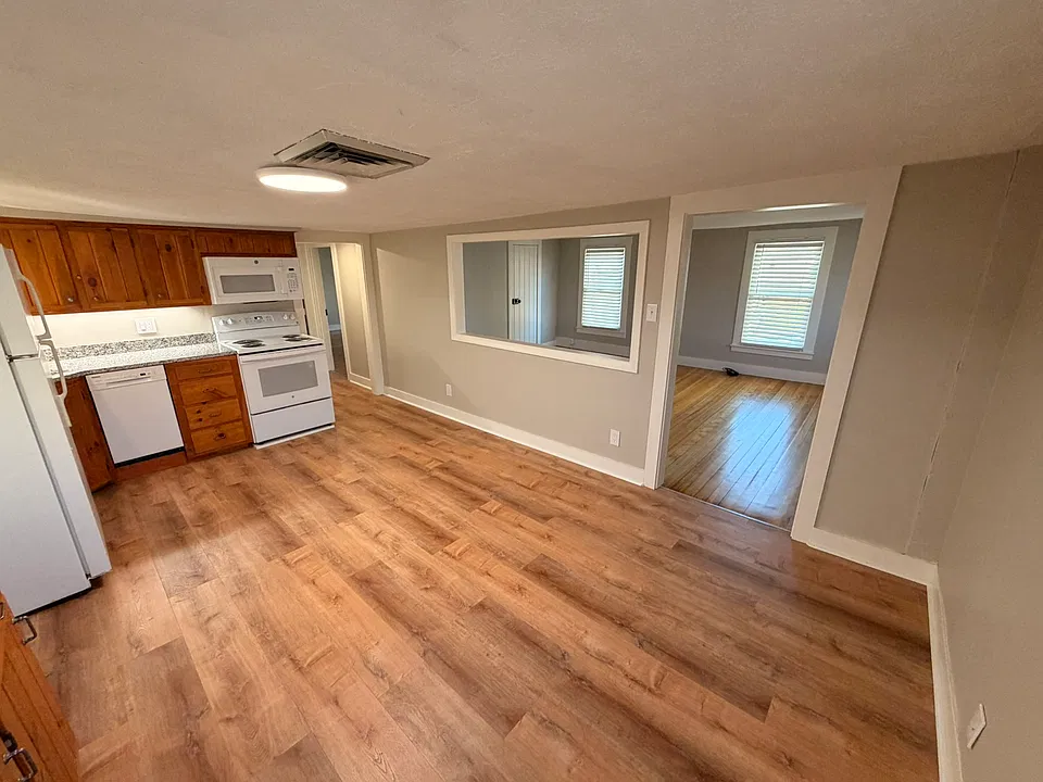 Kitchen looking into living room