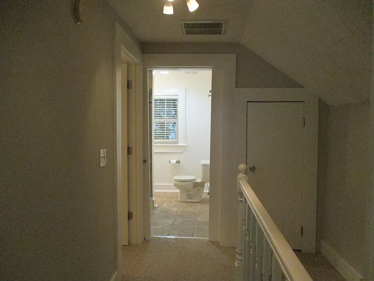 Upstairs hall with walk in closet