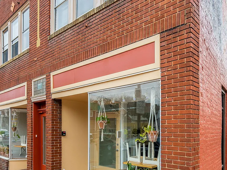 Experience the warmth and charm of this brick exterior with elegant display windows.