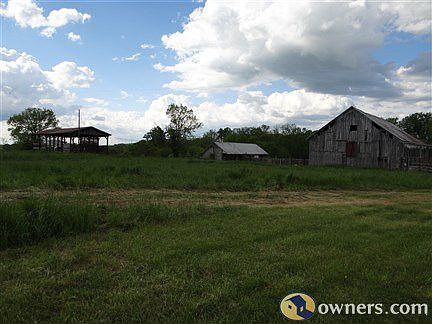 barn #1, covered storage, milking area