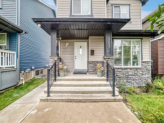 3rd image of 303 E Saddlebrook Cir NE