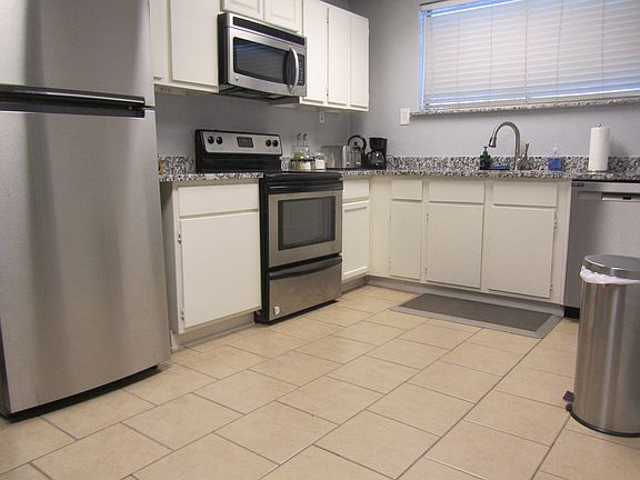 kitchen with stainless steel appliances; cooking vent air to the outside