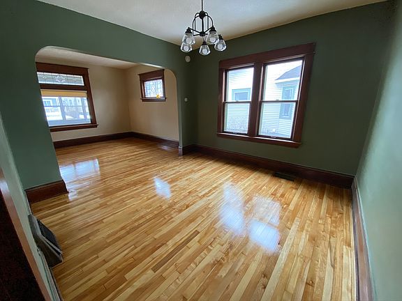 Dining room with original woodwoork and hardwood floors